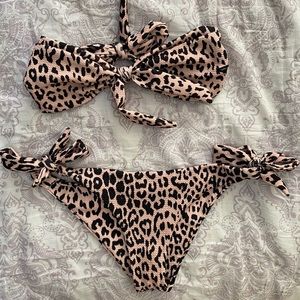 Worn with matching cheetah or black bottoms